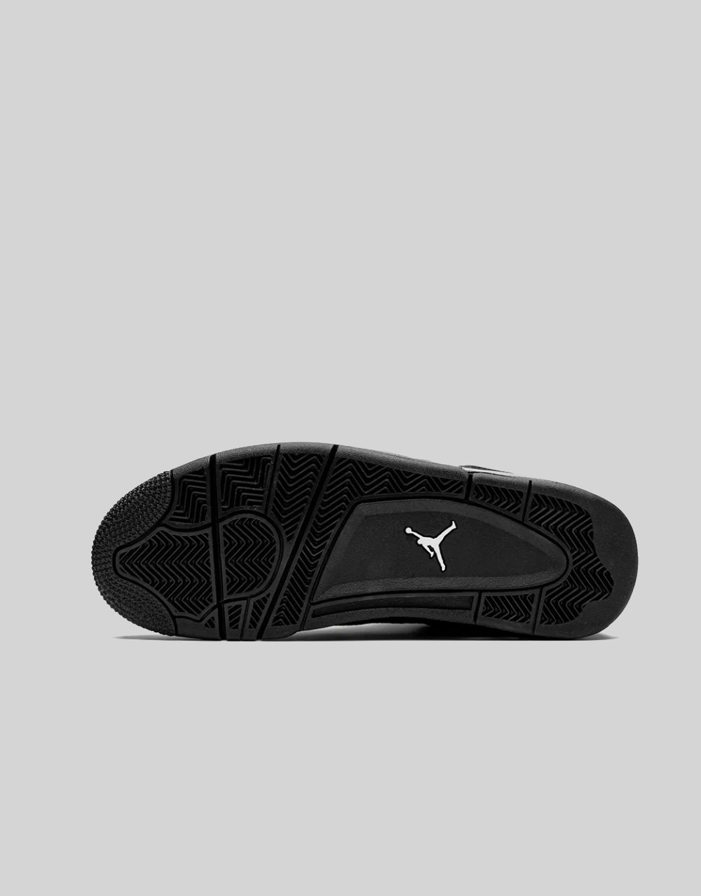 Rear view of Air Jordan 4 Black Cat showing heel support, Air unit and tonal Jumpman branding