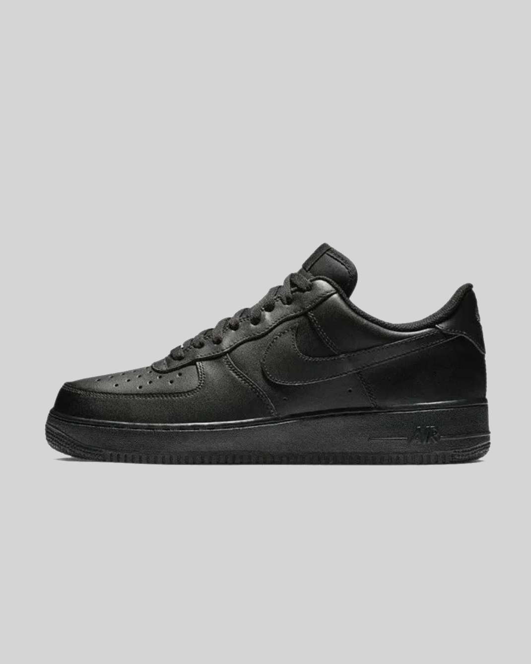 Nike Air Force 1 07 Low triple black leather — medial side view classic sneaker