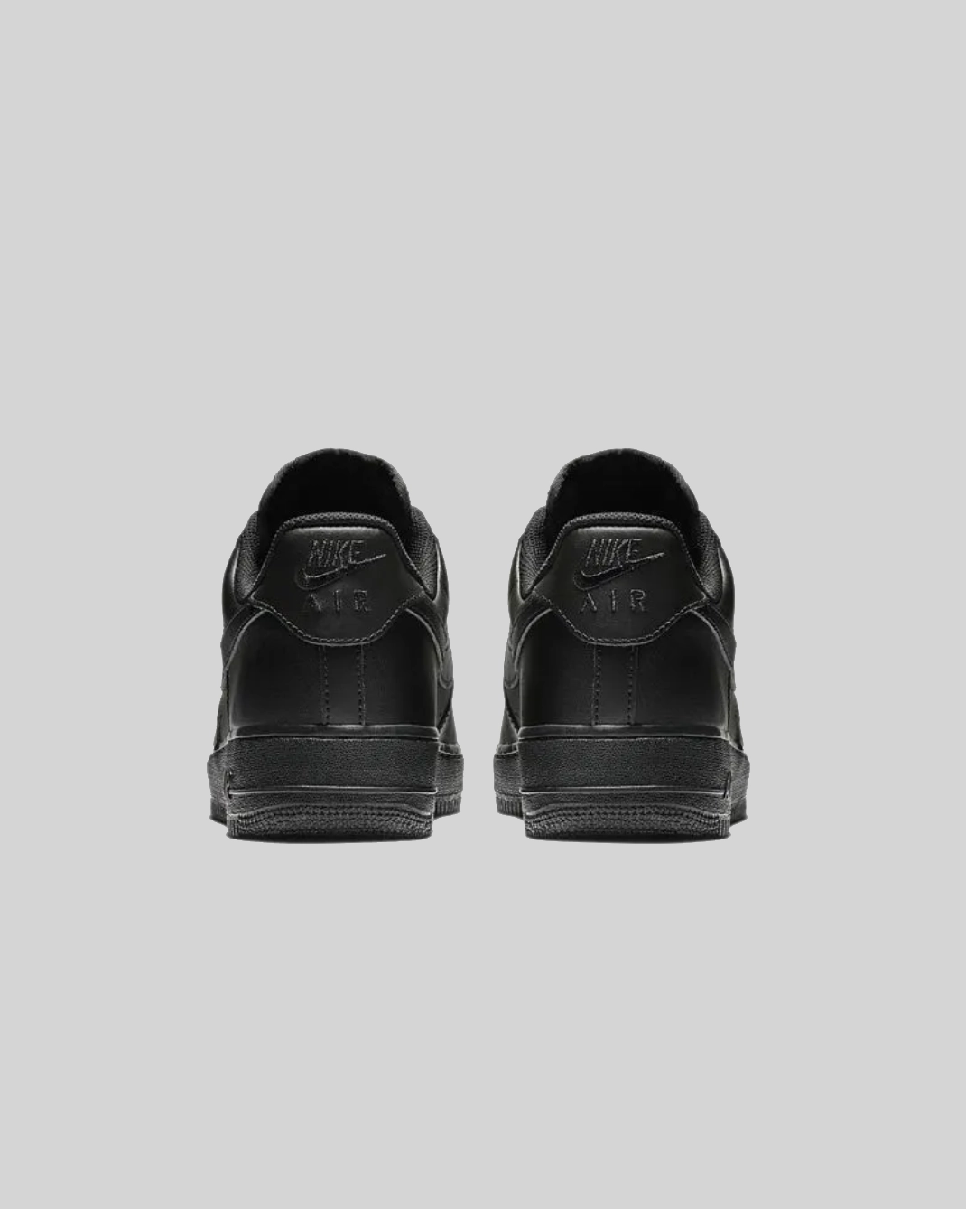 Nike Air Force 1 07 Low black — back heel view pair Nike Air logo detail