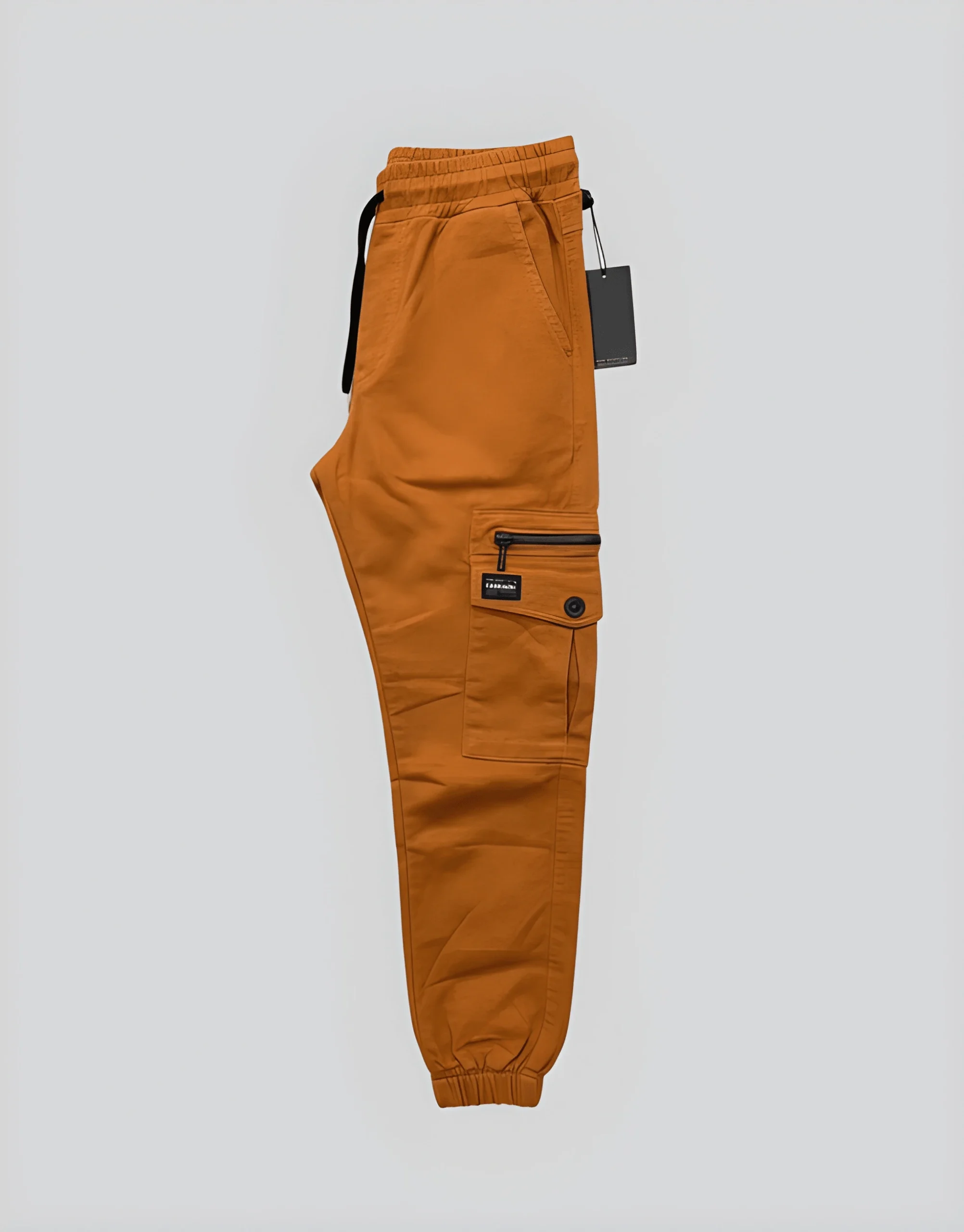 Flat side view of men's camel brown cotton lycra cargo jogger pants with black zippered thigh pocket