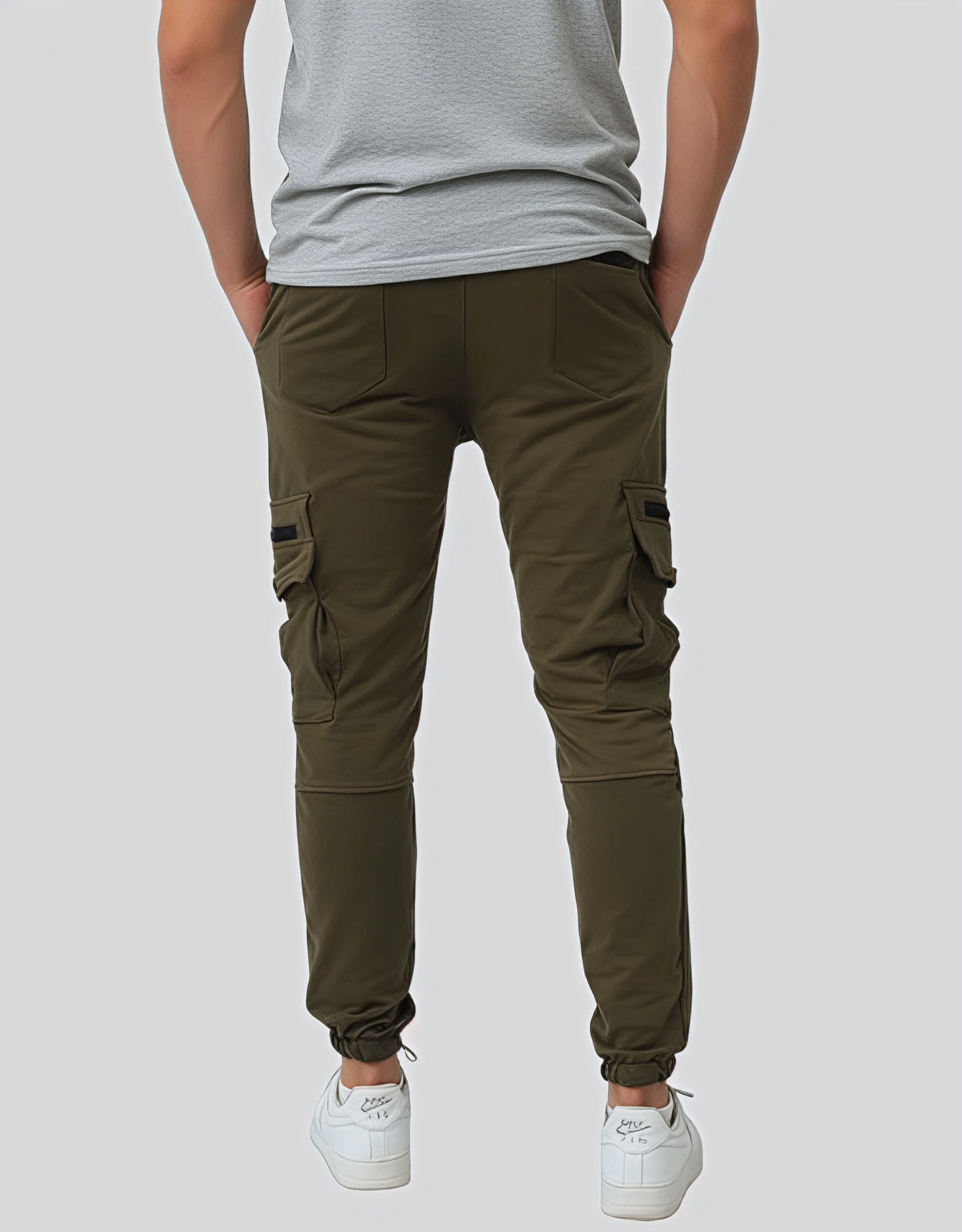 Men's military green cargo jogger pants worn on model back view showing two rear patch pockets dual thigh cargo pockets and ankle drawstring cuffs