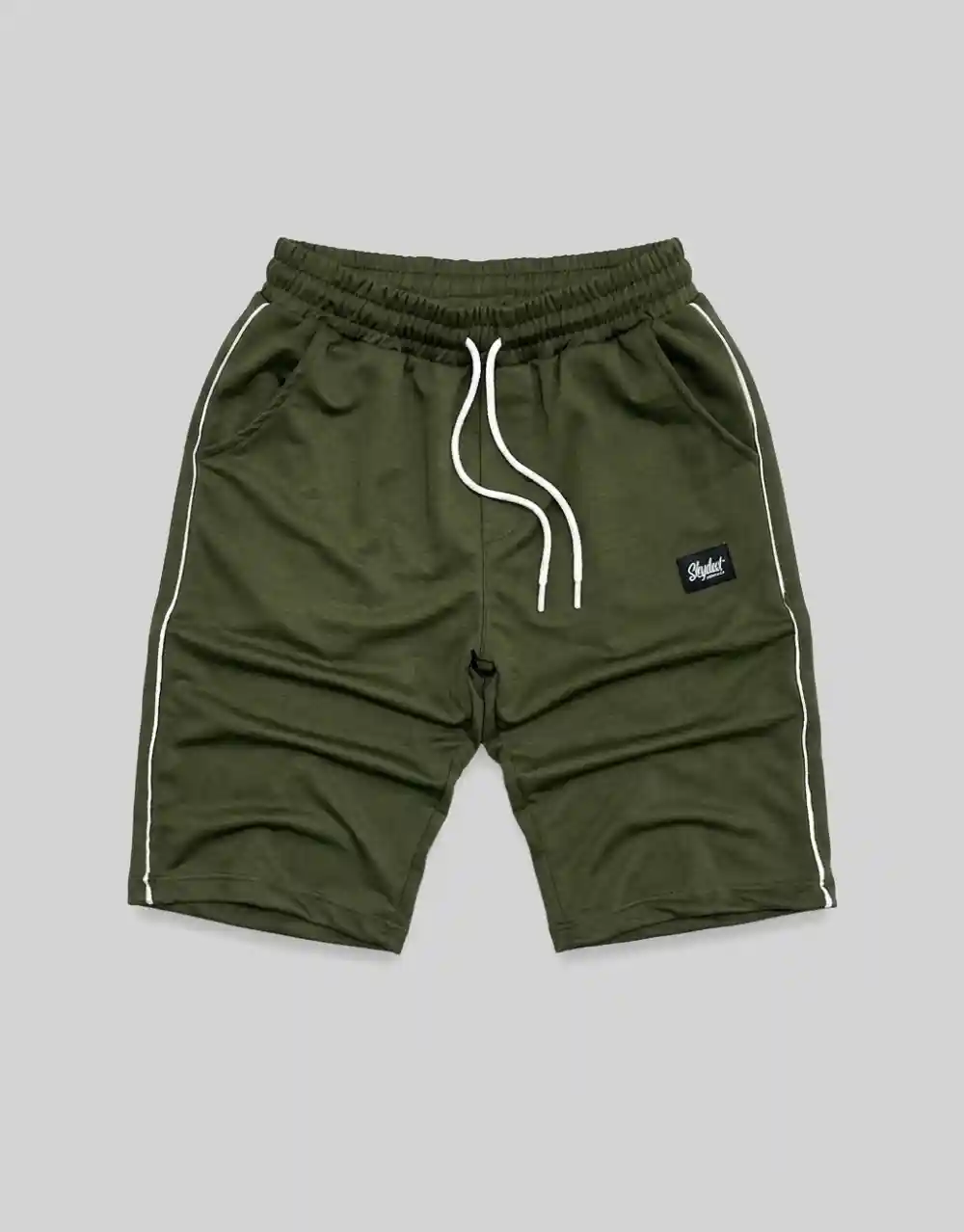 Flat lay of men's military green cotton shorts with white contrast side piping and branded patch